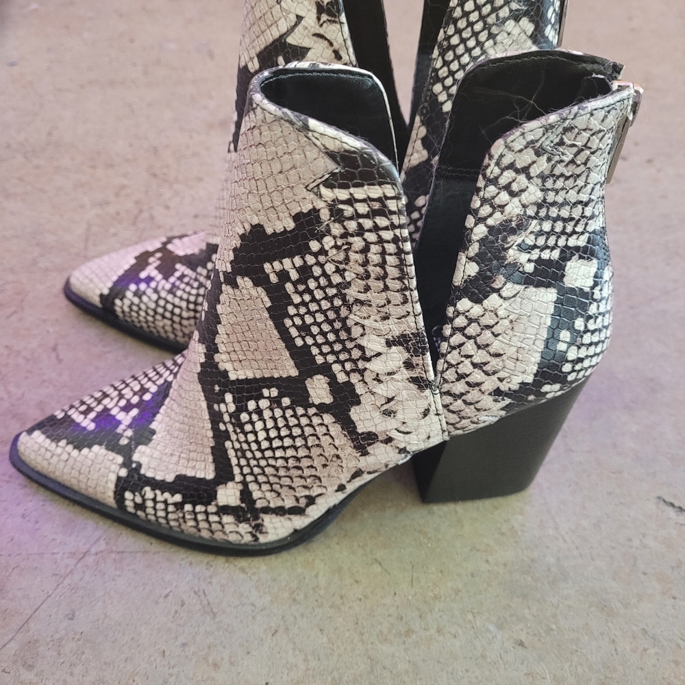 Vince Caputo snakeskin booties.